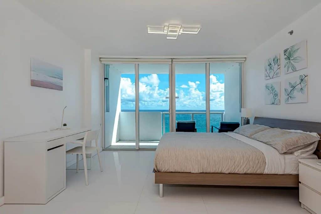 Photo of an ocean view from bed in an Airbnb in Miami. 