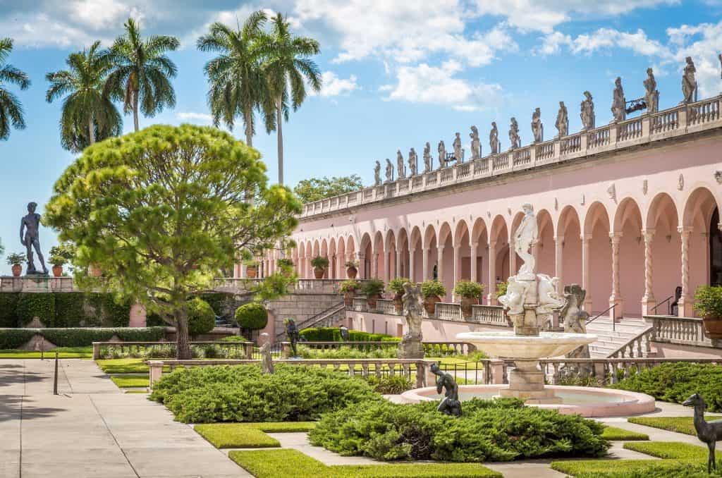 ringling museum is one of the best hidden gems in florida with gardens and a pink building