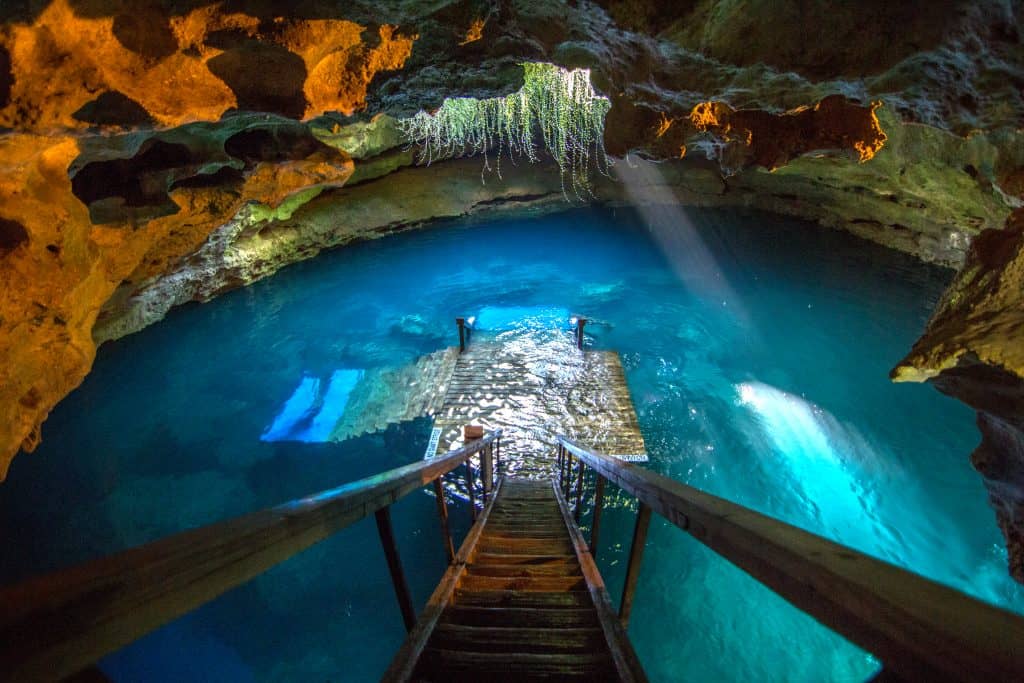 Making the descent into Devil's Den, one of the best springs in Florida.