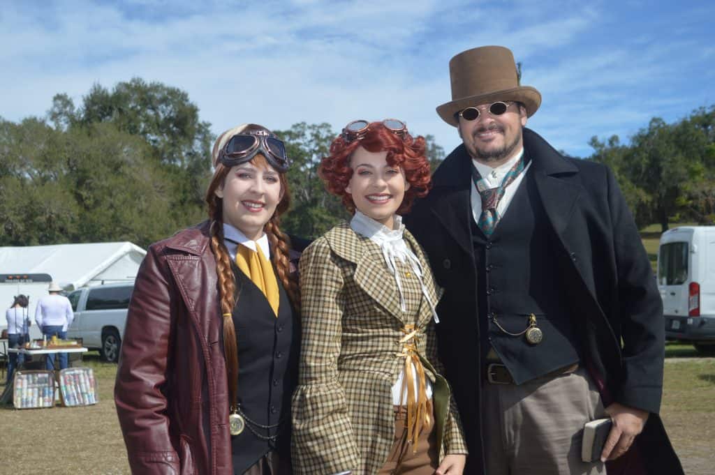 Cosplayers in costume pose at Renninger's Steampunk & Industrial Show in Mount Dora.