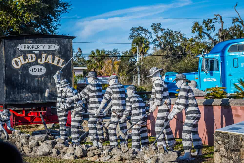 Sculpture of prisoners outside the Old Jail in St. Augustine, one of the most haunted places in Florida. 