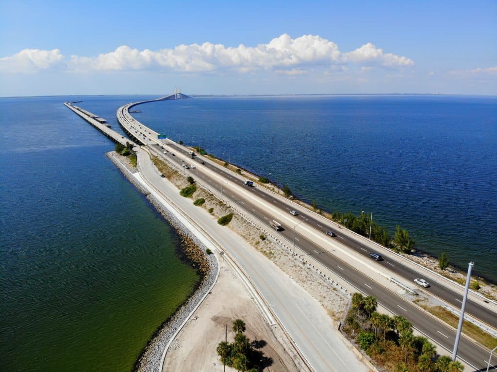 The 4-mile-long fishing pier located off the Skyway Bridge, stretched across blue ocean water, in St. Petersburg Florida