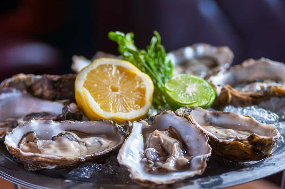 Try the oysters at Lighthouse restaurant one of the best happy hours in Fort Myers