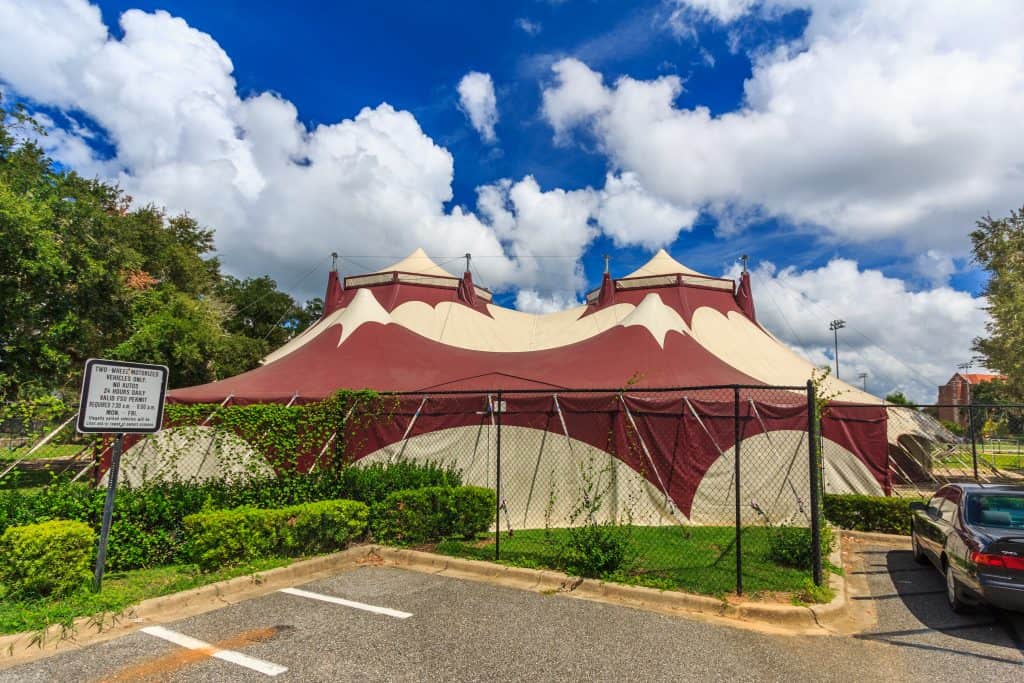 The garnet and gold circus tent stands at the Jack Haskin Circus Complex at Florida State University, one of the best things to do in Tallahassee with kids!