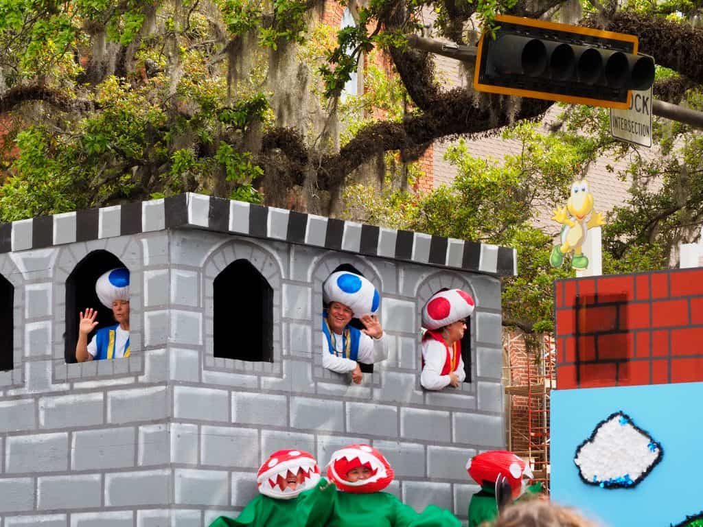 Toads peer out the windows of the castle of Mushroom Kingdom on a festive Mario float during the Springtime Tallahassee Festival!