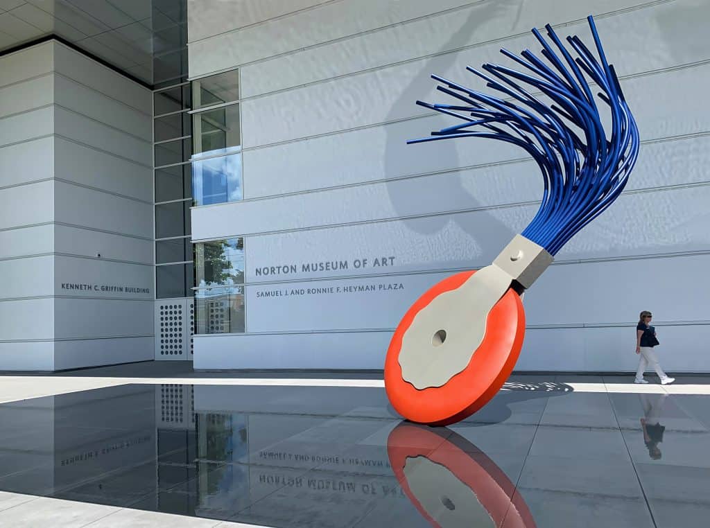 The colorful “Typewriter Eraser” sculpture sits outside the entrance to the Norton Museum of Art.