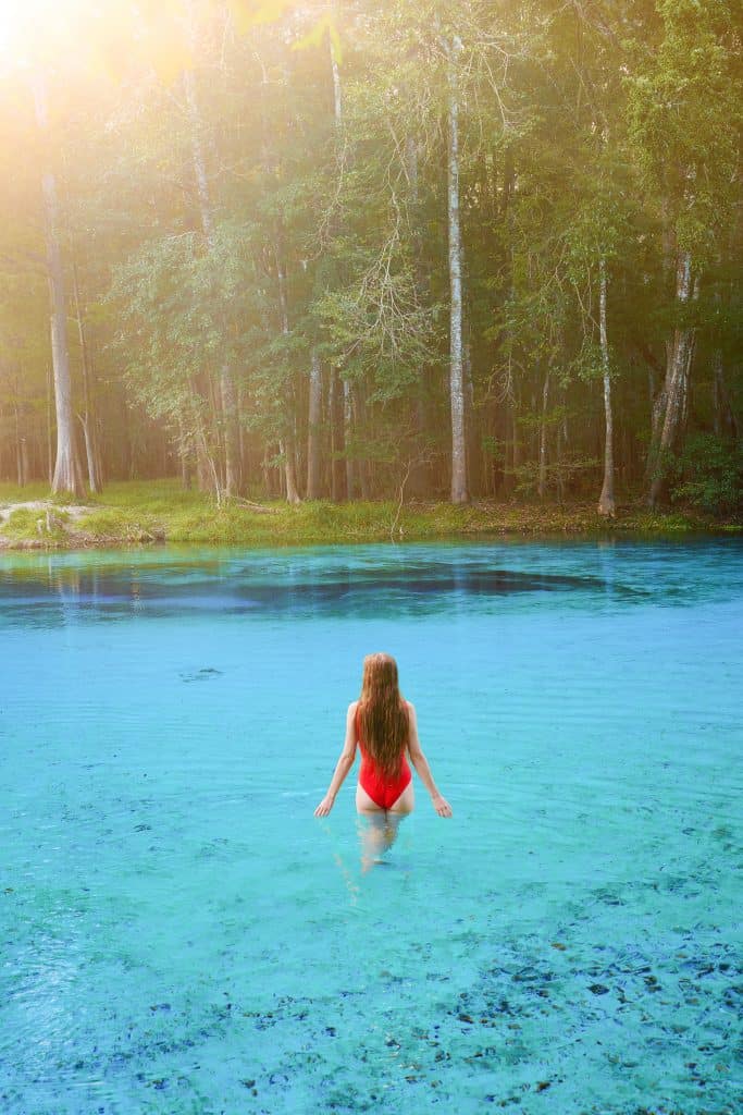 Wading through the cool crisp waters of Gilchrist Blue Springs.