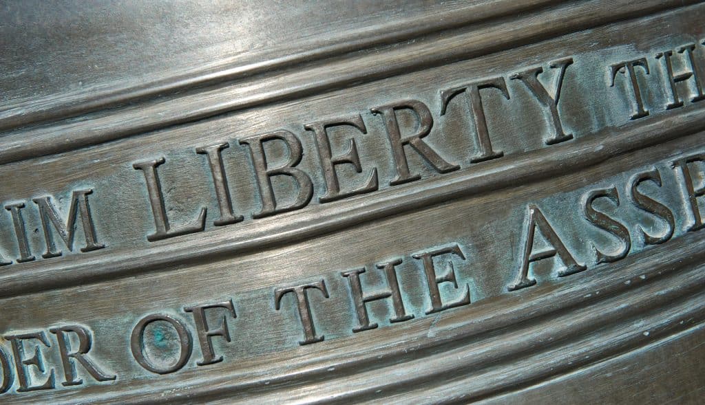 A close-up of the inscription of the Liberty Bell replica at the Liberty Bell Memorial Museum.