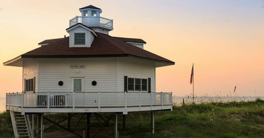 Photo of the exterior of an Airbnb property that is a lighthouse replica.