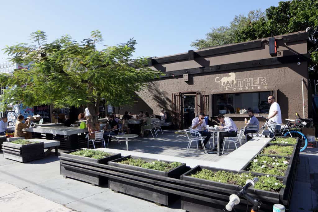 The exterior seating area of Panther Coffee in Miami.