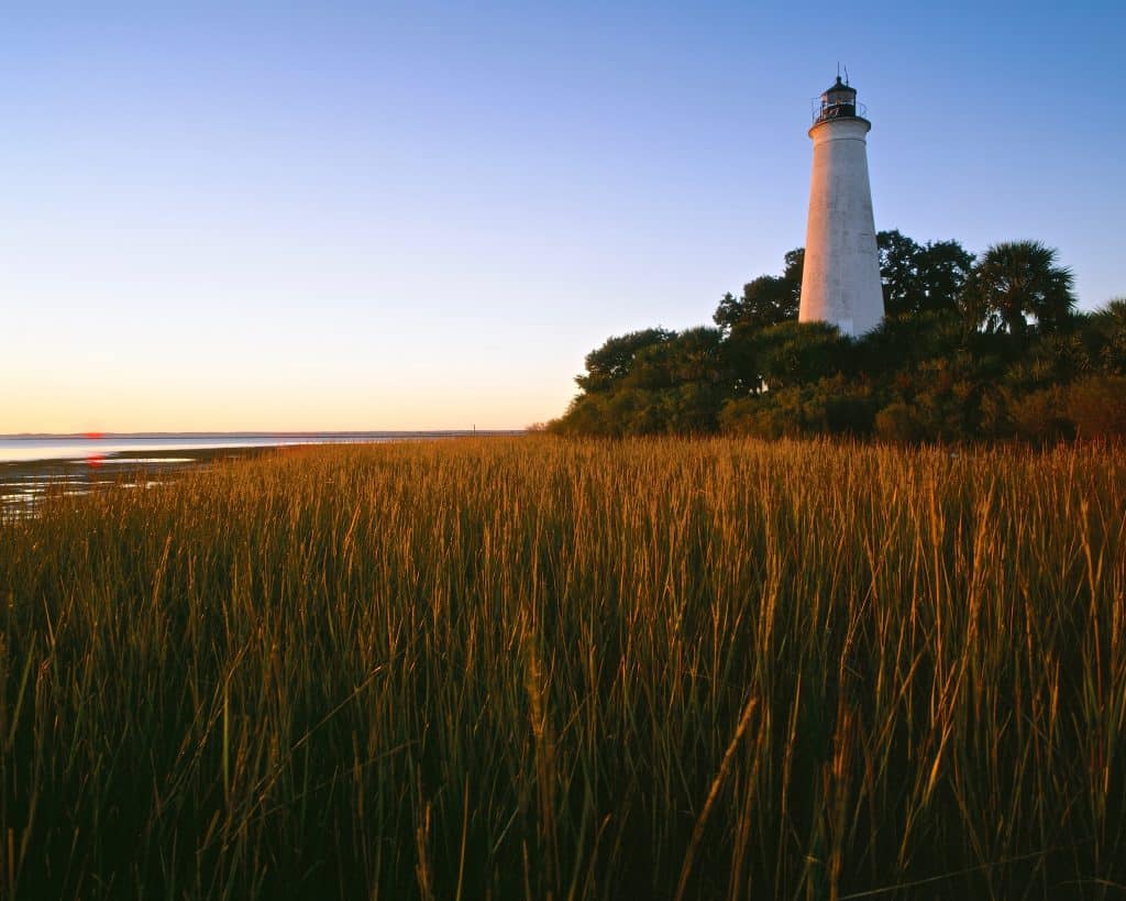 Dusk captures the magnificent colors of the grass surrounding the lighthouse at St. Marks, one of the cutest small towns in Florida.