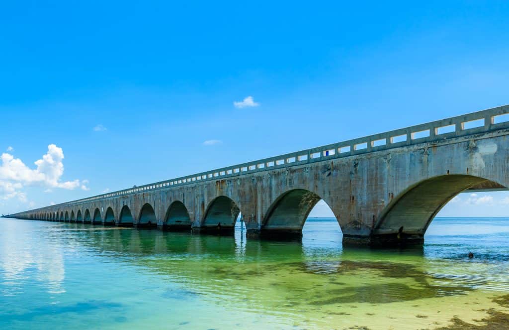 The Florida Keys Overseas Heritage Trail hovers over crystal clear waters.