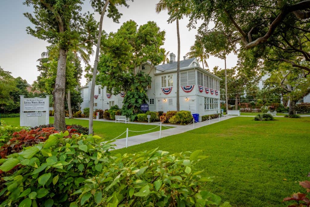 The Harry S. Truman Little White House sits surrounded by lush foliage, one of the best things to do in the Keys.