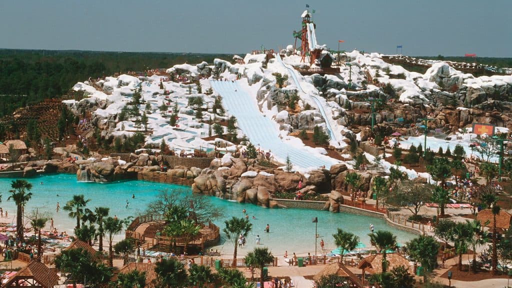 A wide view of the slopes and pool of Blizzard Beach  