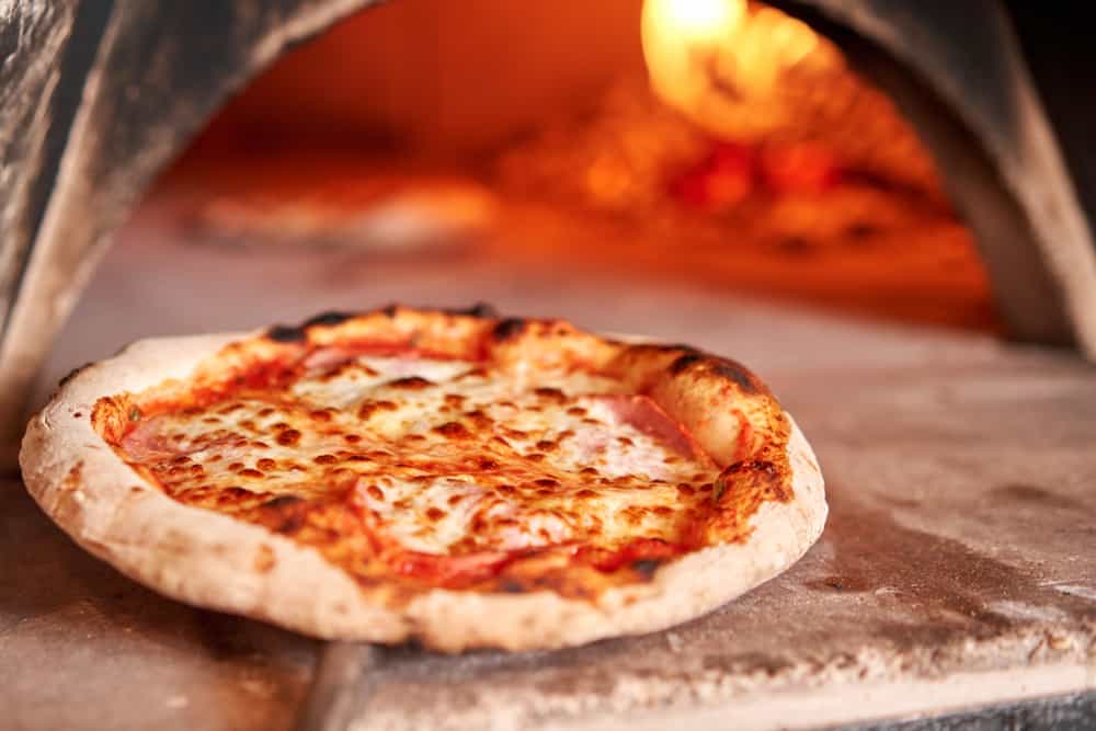 wood fired pizza in the pizza oven