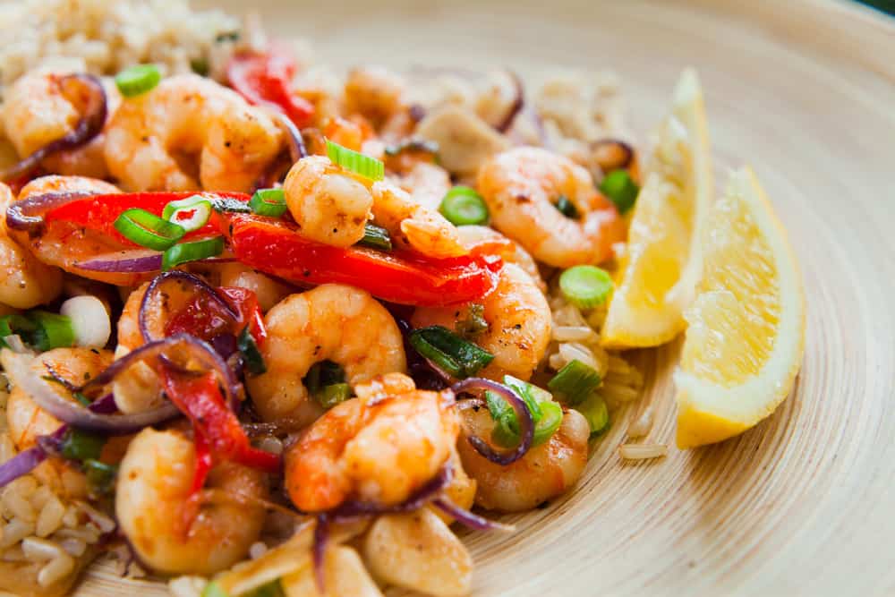Try the Caribbean style shrimp bowl with rice, peppers in a spicy sauce.