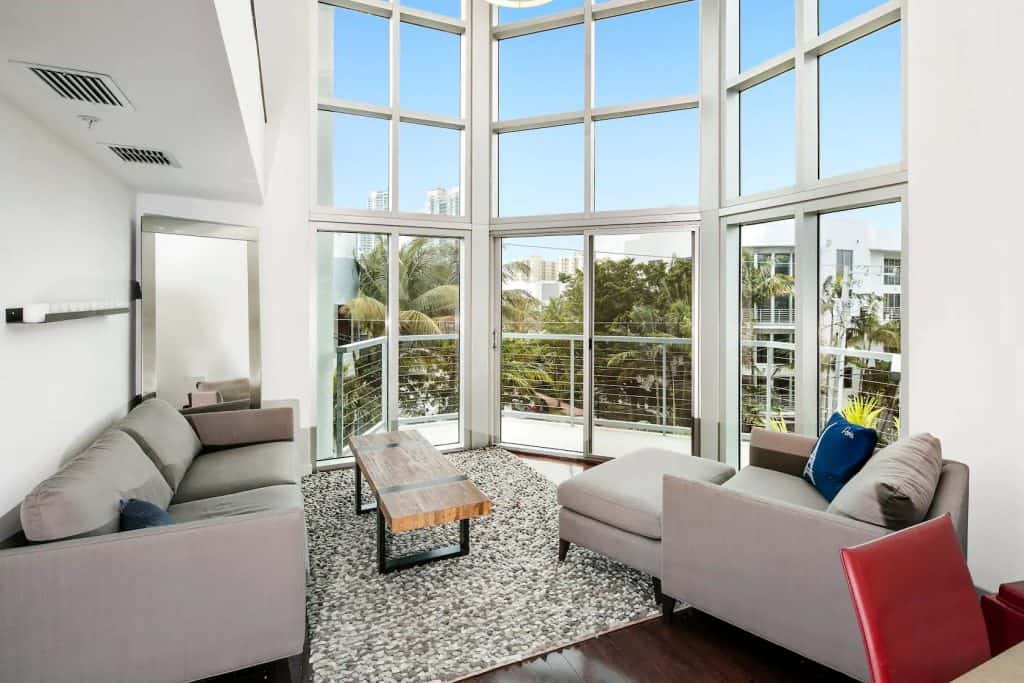 Photo of living room inside a luxury loft Airbnb in Miami.