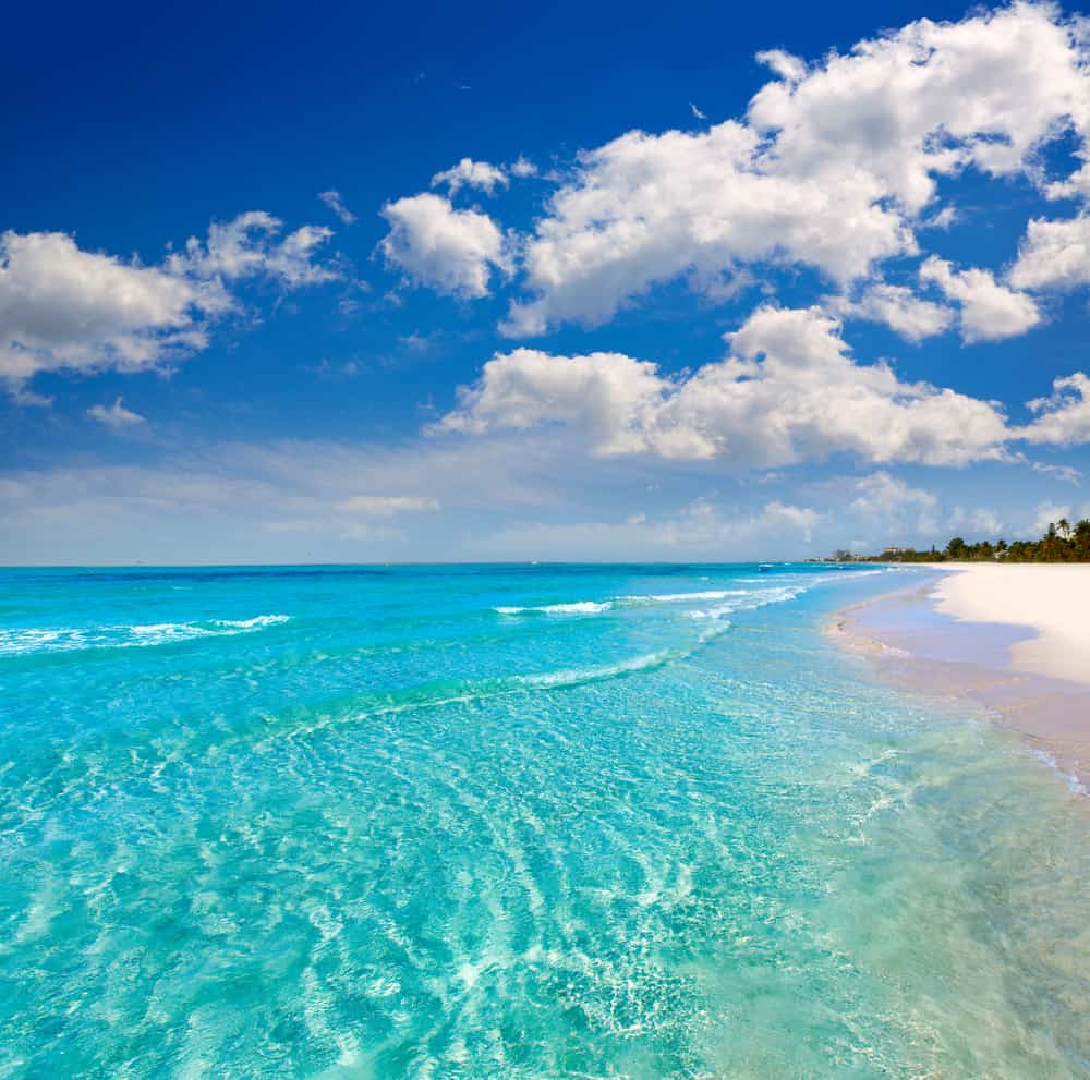 The beautiful, clear water of Fort Myers Beach stretching out to the horizon.