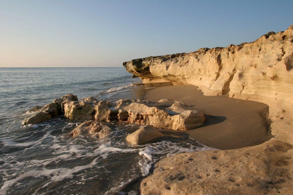 Hidden gems florida blowing rocks at low tide at sunset.