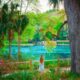 a girl in summer dress overlooking on of the Florida Springs crystal clear water on a day trip from Florida