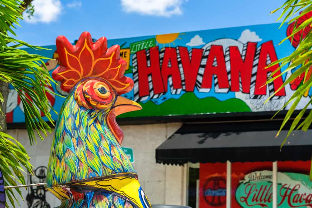 Colorful chicken statue in front of a Little Havana restaurant.