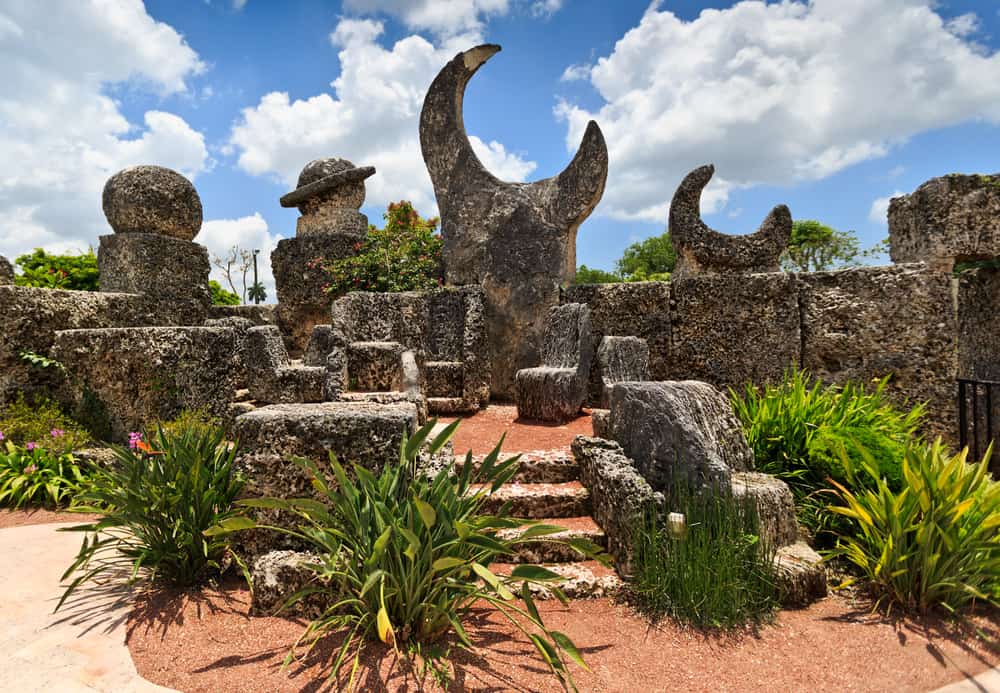 Sculptures made of the same gray rock to make a castle-like structure.