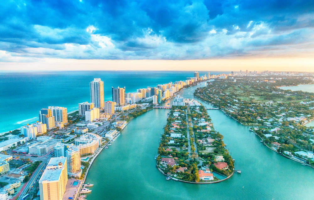 sunrise over Miami skyline with islands Miami to Key West drive