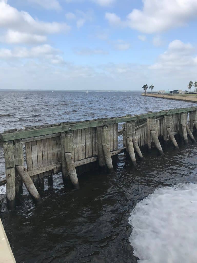 Waters crash into the barriers at Lake Jessup.