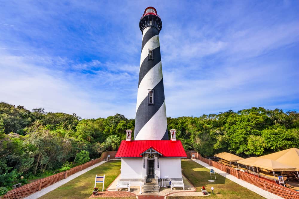 Daytime photo of St. Augustine Lighthouse, one of the most haunted places in Florida. 