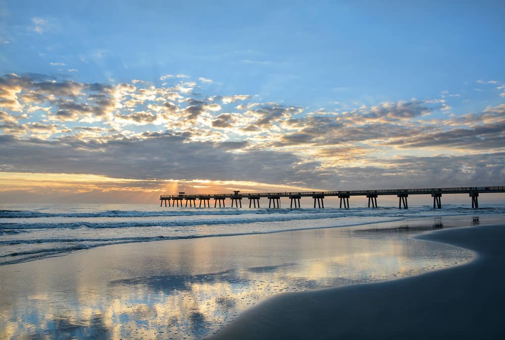 The pier at Jacksonville Beach at sunset is one of the best free things to do in Jacksonville Florida.