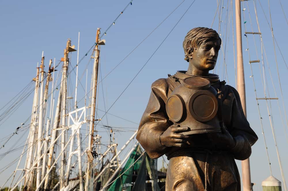 historic statue of a diver in tarpon springs florida