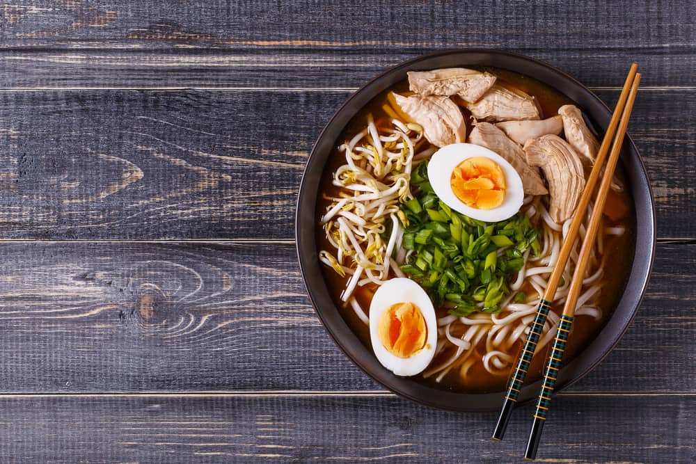 bowl of ramen with pork, eggs, bean sprouts, green onion, and noodles restaurants in Naples