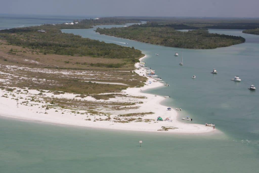 A drone shot of Keewaydin Island, one of the best beaches in Naples found in the Ten Thousand Islands. 