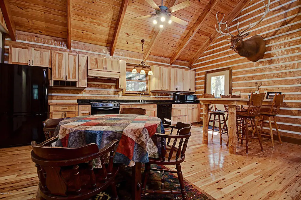 Photo of the cozy inside of an Airbnb called the Log Home Guest House, which is one of the best cabins in Florida.