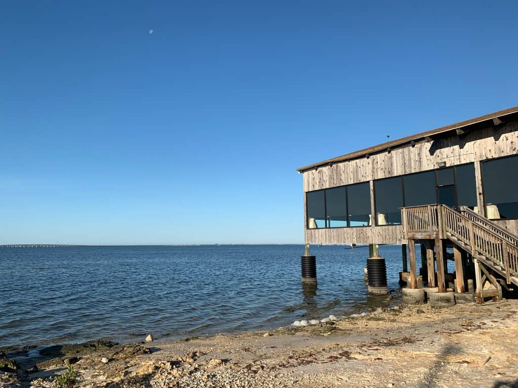 The dining room of Whiskey Joe's jutting out into the Hillsborough Bay.