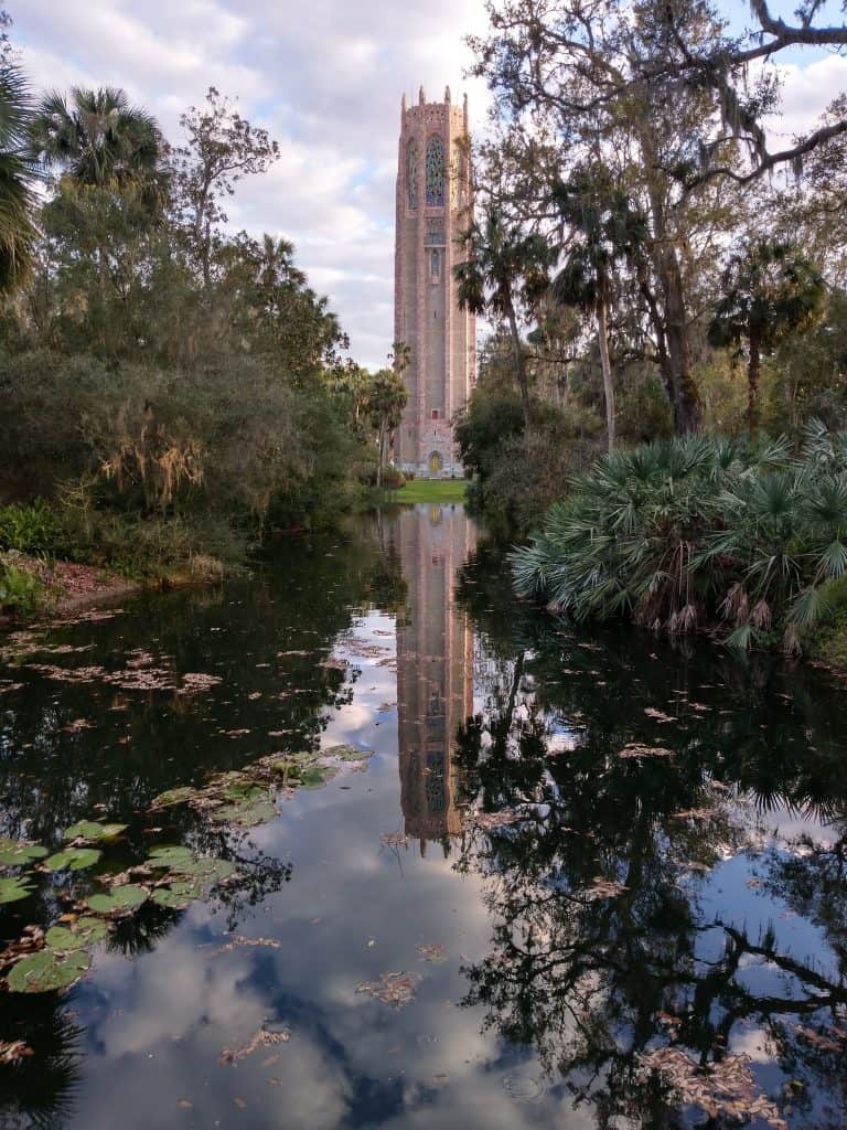 A view of Bok Tower reflected in the reflecting pool, one of the best things to do on a date night in Orlando.