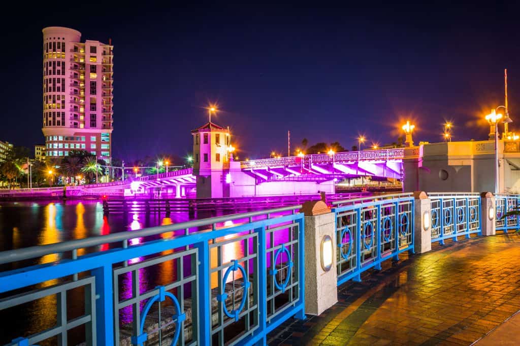 The Tampa Riverwalk, romantically lit for couples during Fourth Friday, a perfect date night in Tampa.