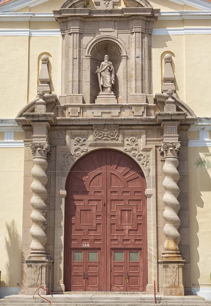 The facade and beautifully decorated doors of St. Paul's Cathedral, one of the best things to do in Daytona Beach, FL.