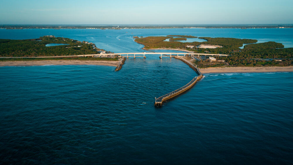 Aerial view of large bridge connecting to Vero Beach, one of the best places to see sea turtles in Florida. 