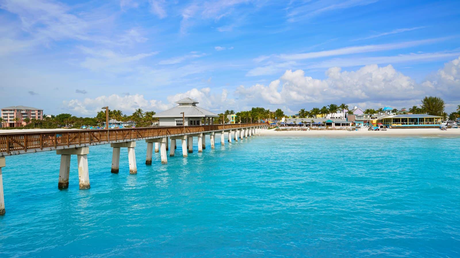 The Fort Myers Pier sits over clear turquoise waters.