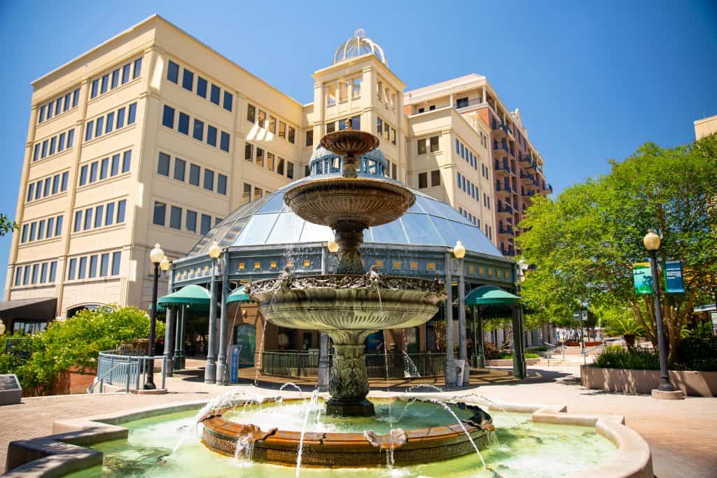 A fountain bubbles downtown in the heart of College Town, a neighborhood for tourists and alumni, one of the most fun things to do in Tallahassee.