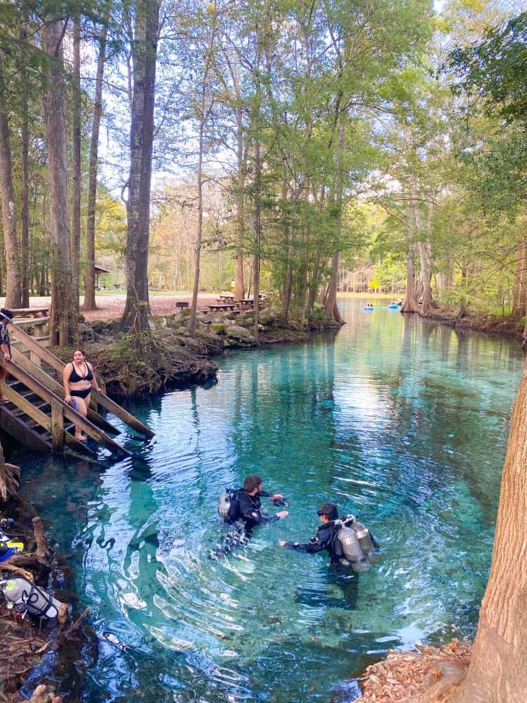 Two divers getting ready to dive at Ginnie Springs.