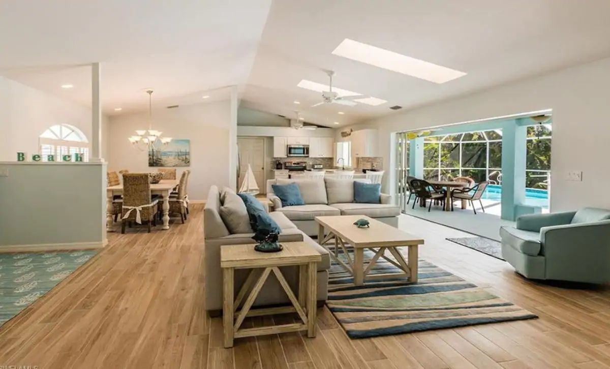 Photo of the living room, dining room, kitchen, and patio at an Airbnb on Marco Island.