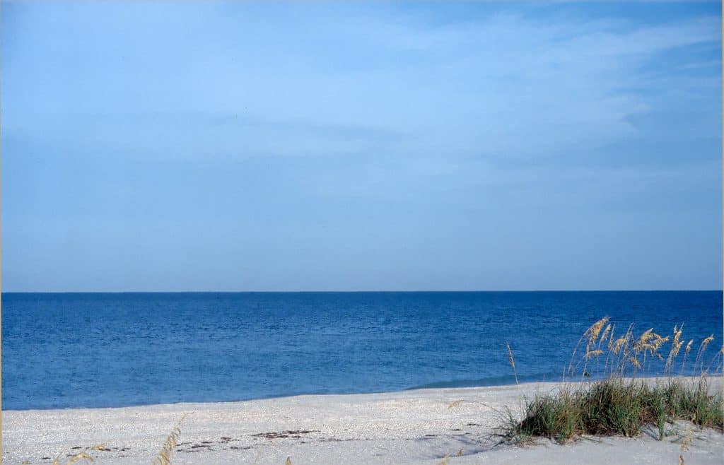 The blue of the ocean and the blue of the horizon meet at Sunset Beach on Treasure Island, one of the best beaches in Clearwater.