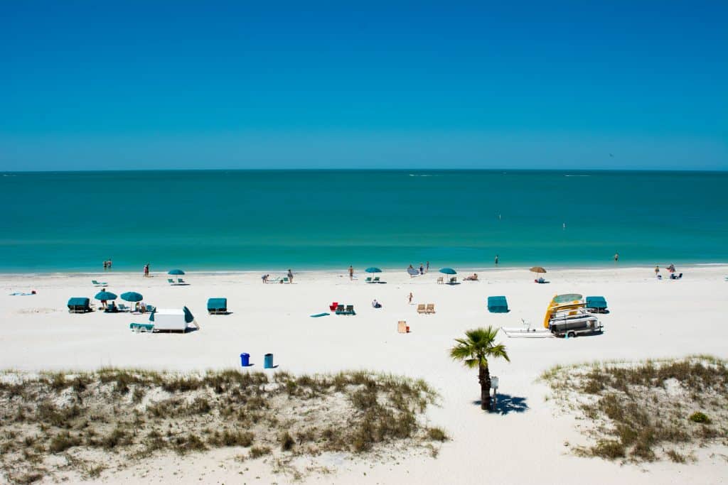 The Municipal Beach at Treasure Island, full of cabanas and sunbathers. 