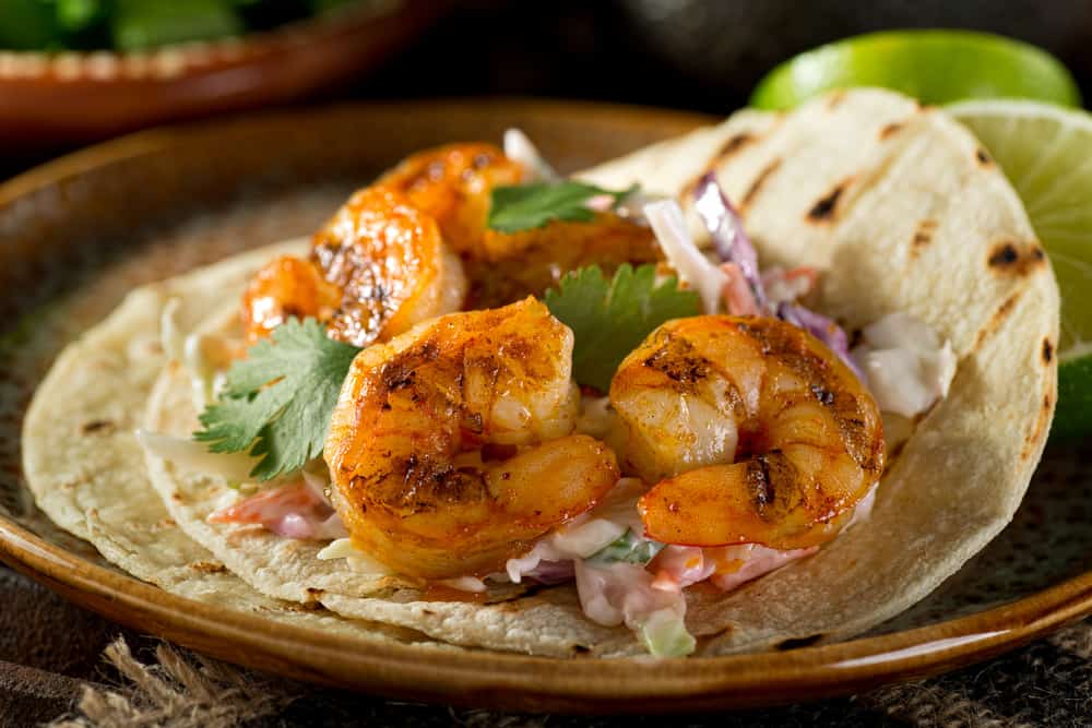 Try the shrimp tacos at Cabo Island Bar and Grill that serves up Mexican food and seafood