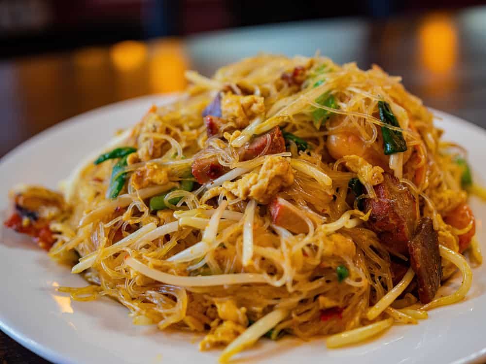 Try the Singapore Noodles at Lucy Ho's restaurant in midtown Tallahassee called Masa