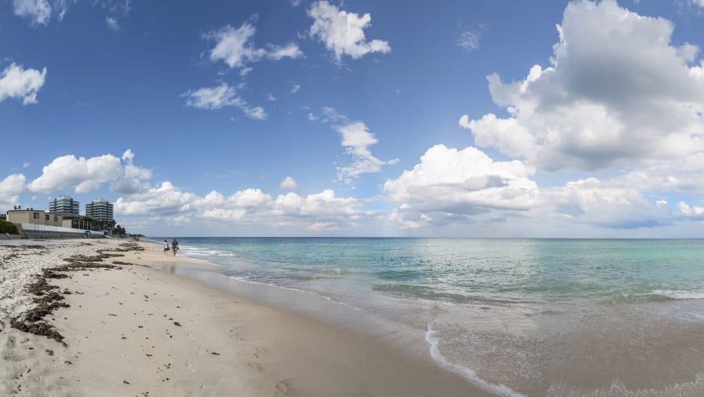 Clouds drift over the crystalline waters of Vero Beach, one of the best family beaches in Florida. 