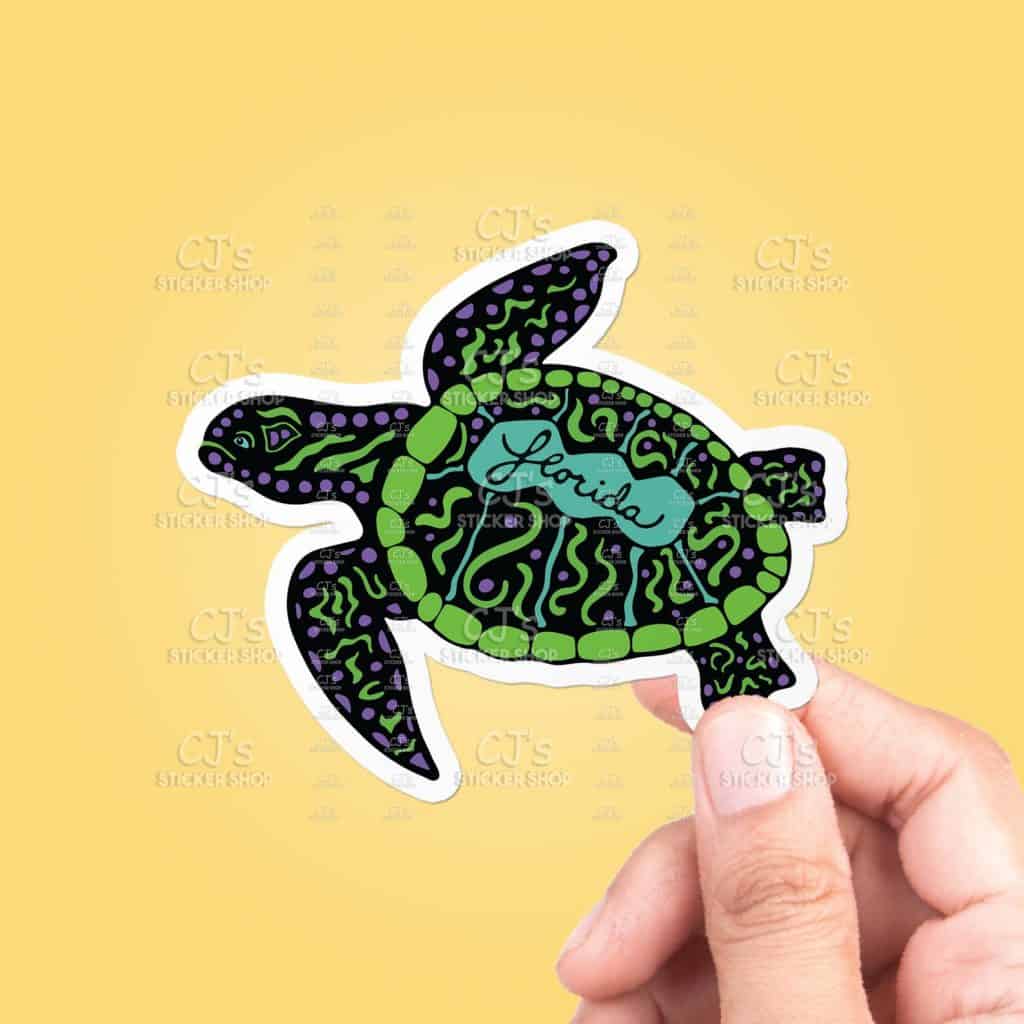 Photo of a black and green sea turtle sticker, one of the best Florida gifts and souvenirs. 