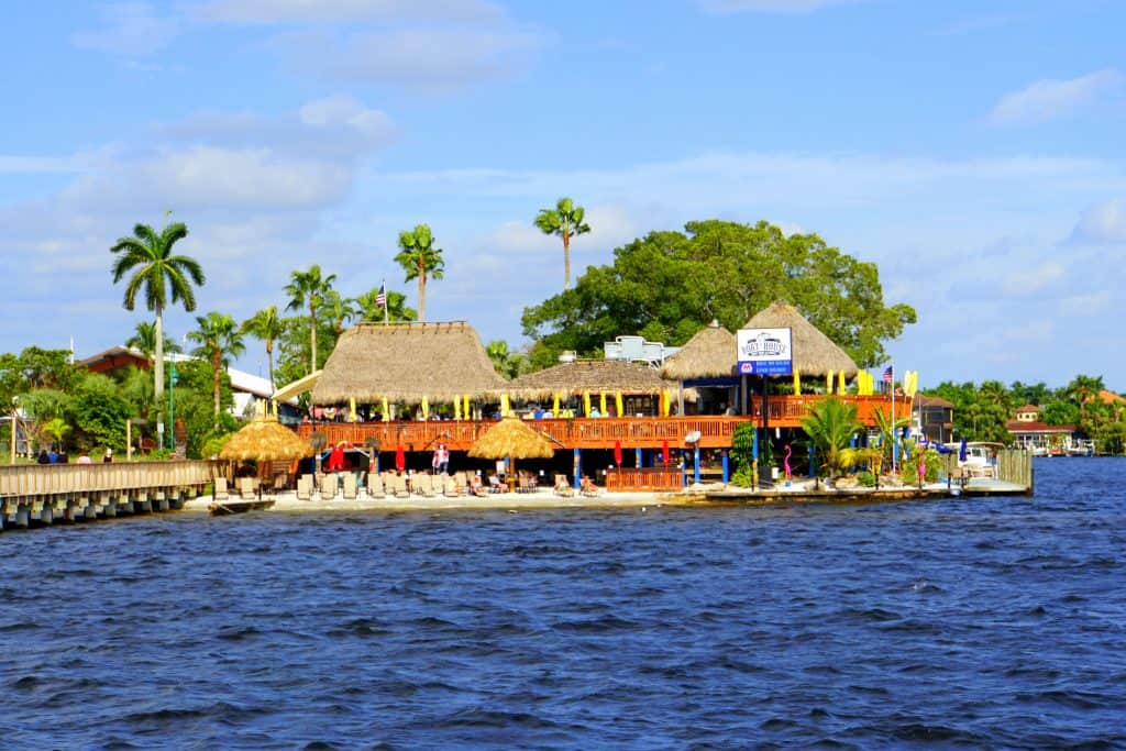 The Boat House Tiki Bar & Grill sits on the waters of the Caloosahatchee River, one of the best things to do in Cape Coral. 